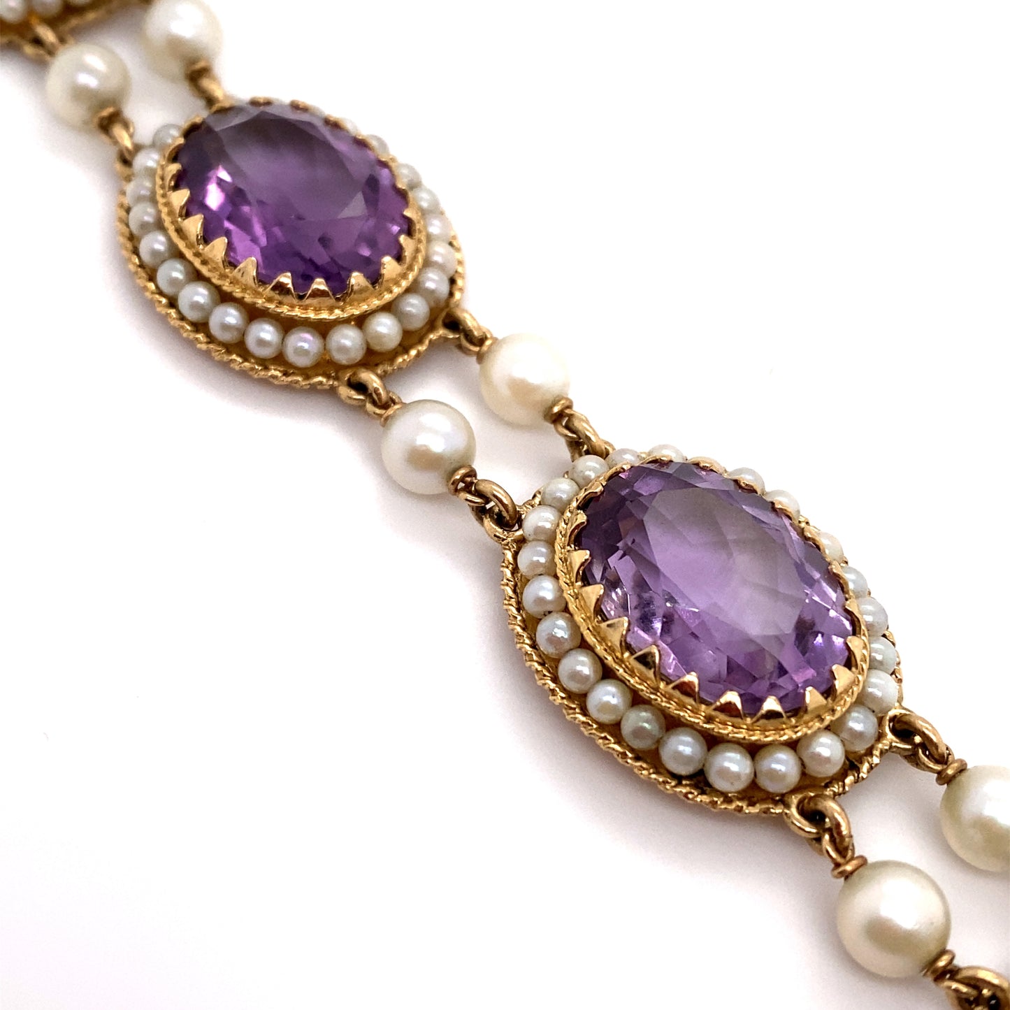 Circa 1950 Retro Amethyst and Pearl Halo Link Bracelet in 14K Gold