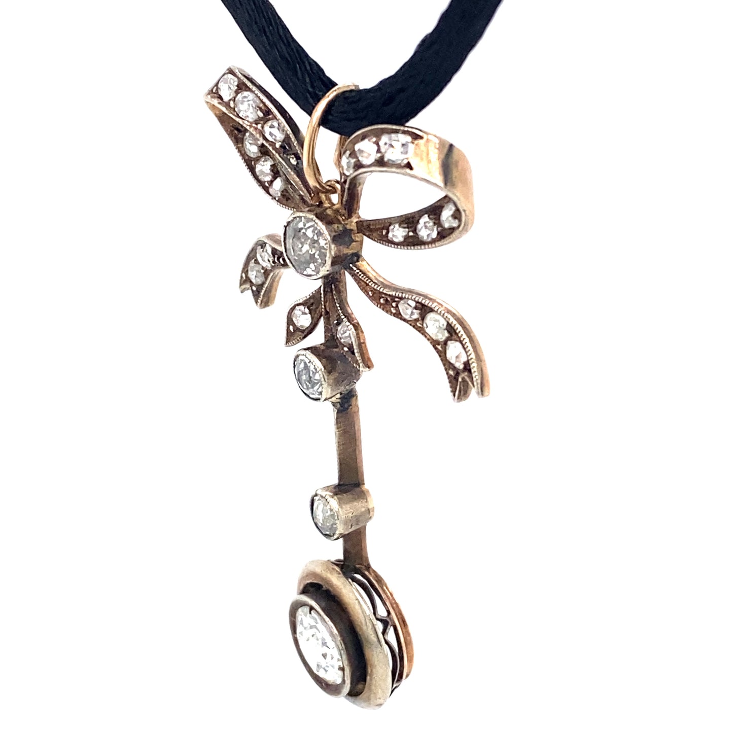Circa 1890s Victorian Gold and Platinum Diamond Drop Bow Pendant on Silk Cord