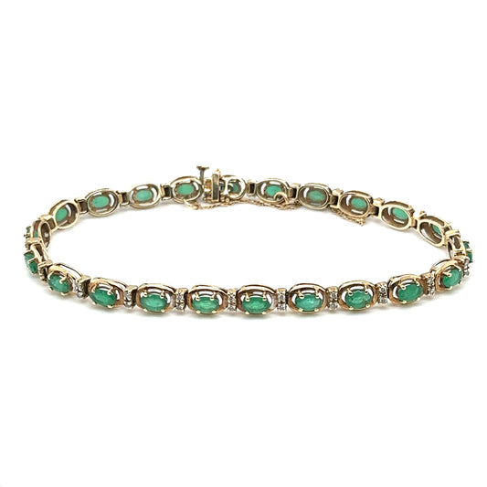 Circa 1980s 1.25 CTW Oval Emerald and Diamond Tennis Bracelet in 14K Gold