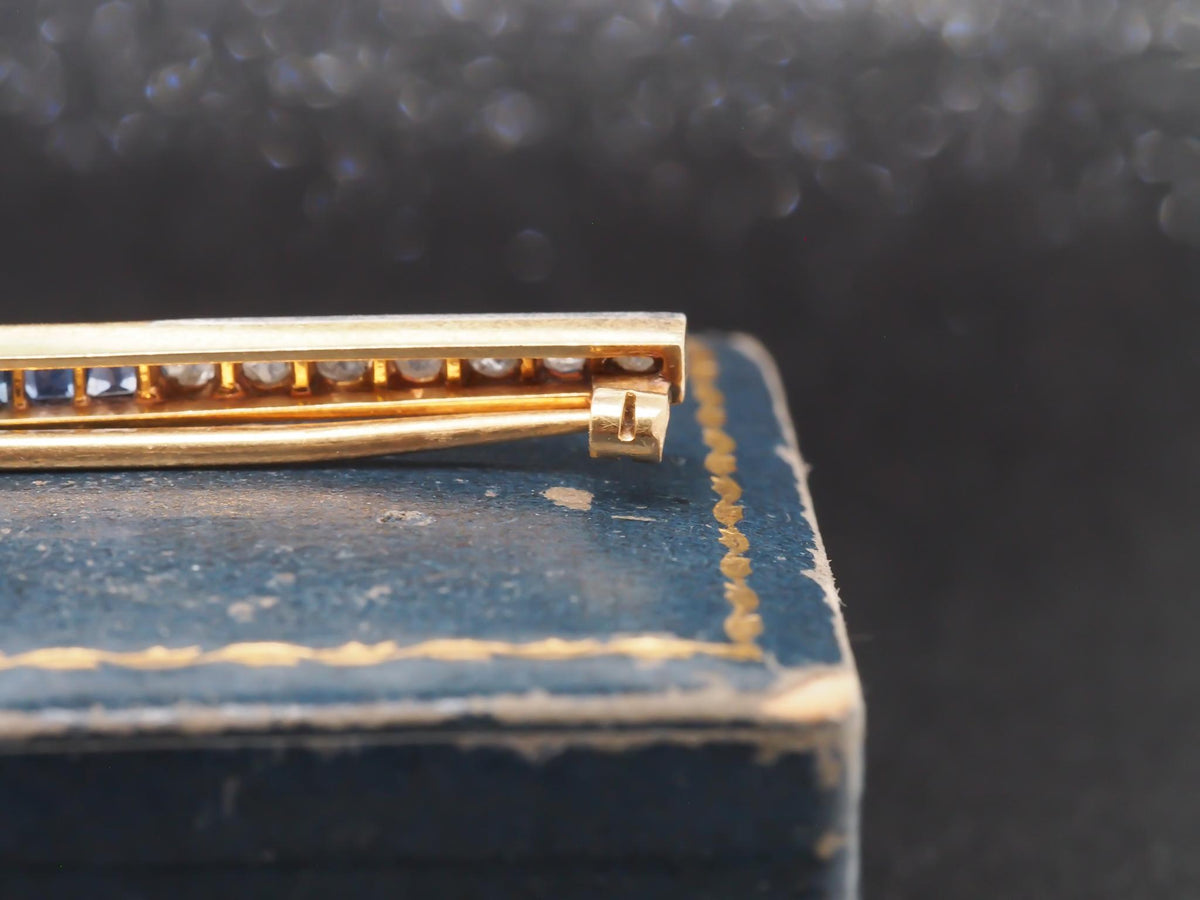 Circa 1920s Art Deco 18K Yellow Gold & Platinum Sapphire and Diamond Bar Pin -