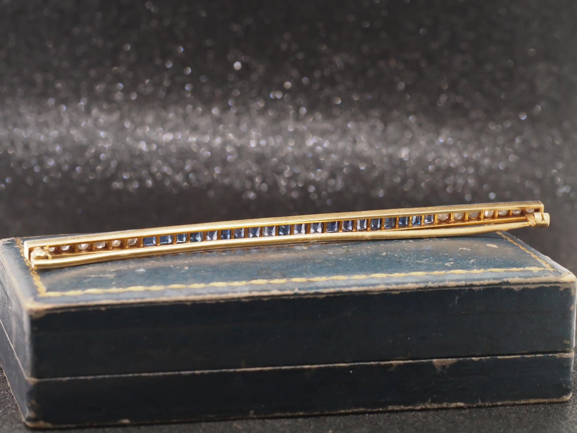 Circa 1920s Art Deco 18K Yellow Gold & Platinum Sapphire and Diamond Bar Pin -