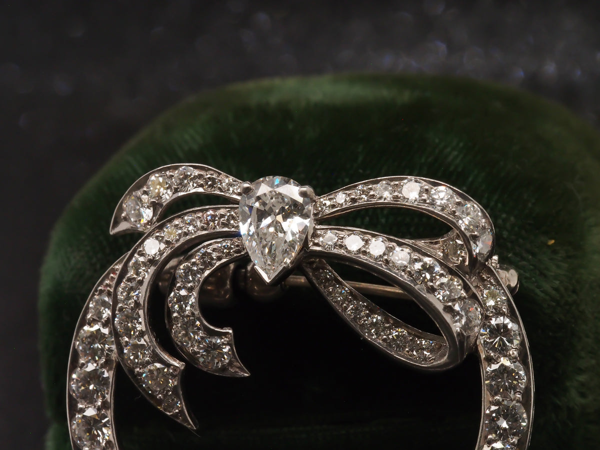 Platinum 1940s GIA Pear Shape & Round Diamond Ribbon Brooch