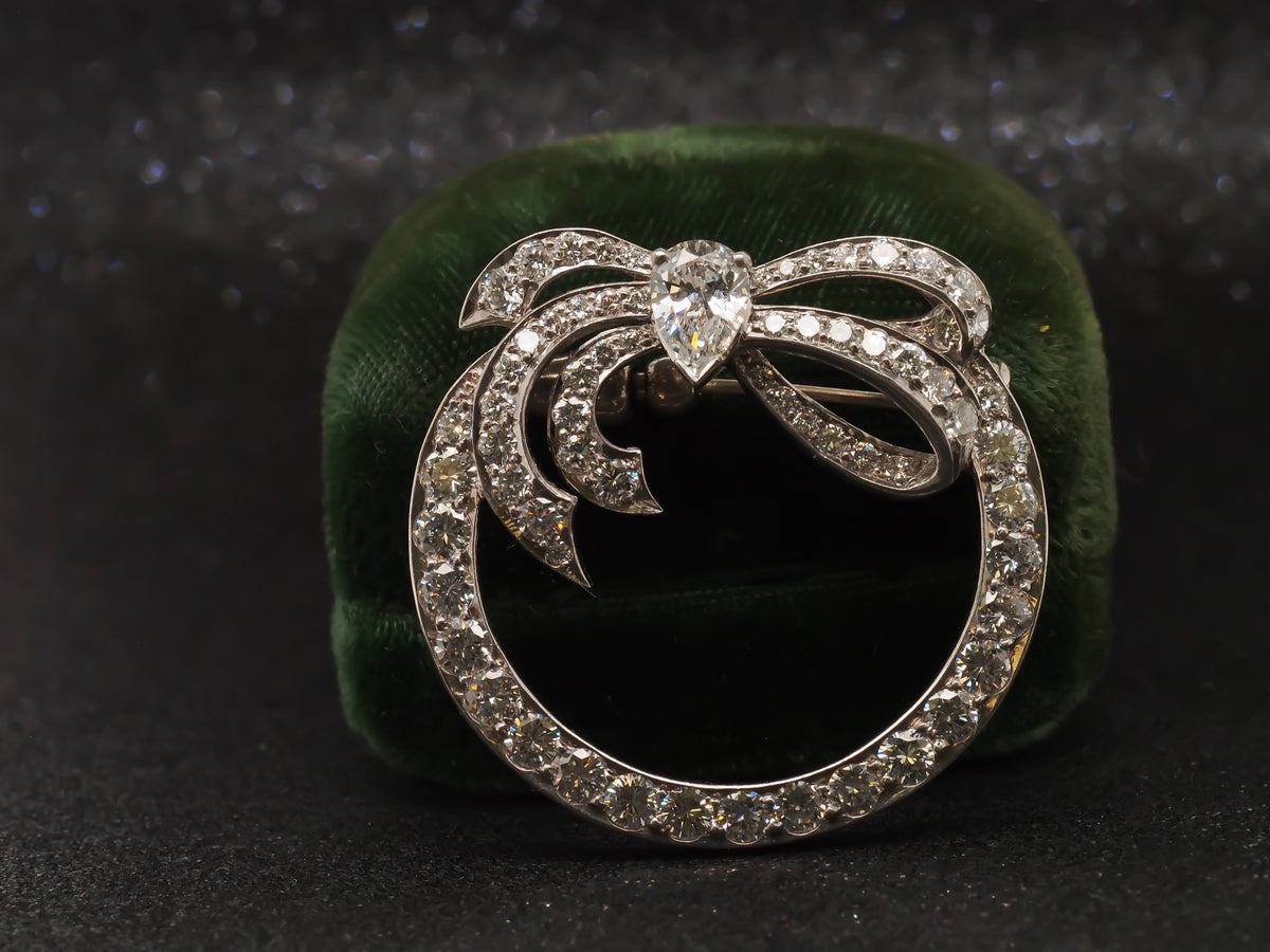 Platinum 1940s GIA Pear Shape & Round Diamond Ribbon Brooch