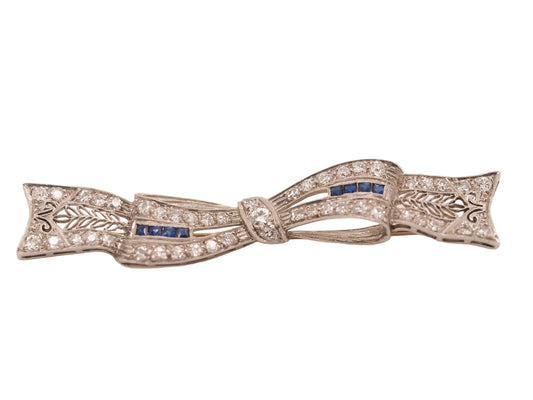 Circa 1920s Art Deco Platinum Sapphire and Diamond Ribbon Brooch