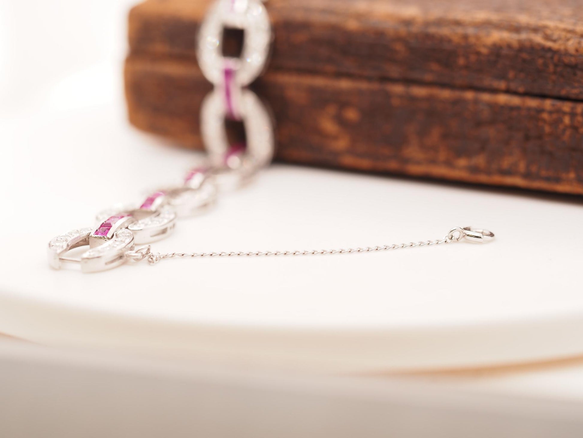 Circa 1930s Art Deco Platinum and Palladium Natural Ruby and Diamond Bracelet