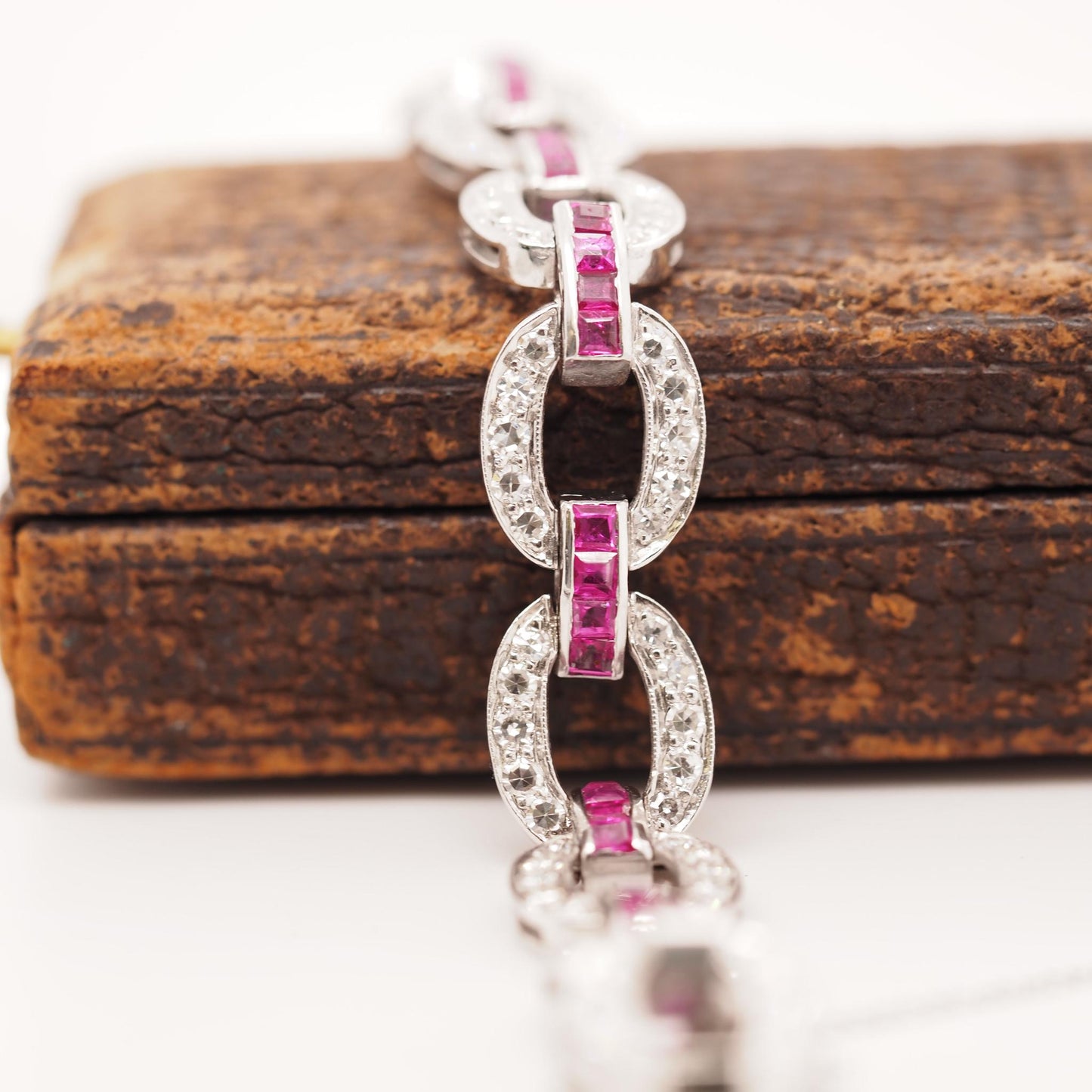 Circa 1930s Art Deco Platinum and Palladium Natural Ruby and Diamond Bracelet