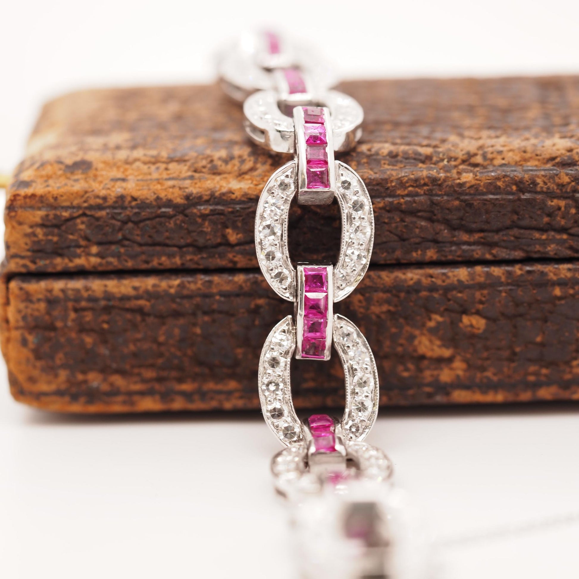 Circa 1930s Art Deco Platinum and Palladium Natural Ruby and Diamond Bracelet