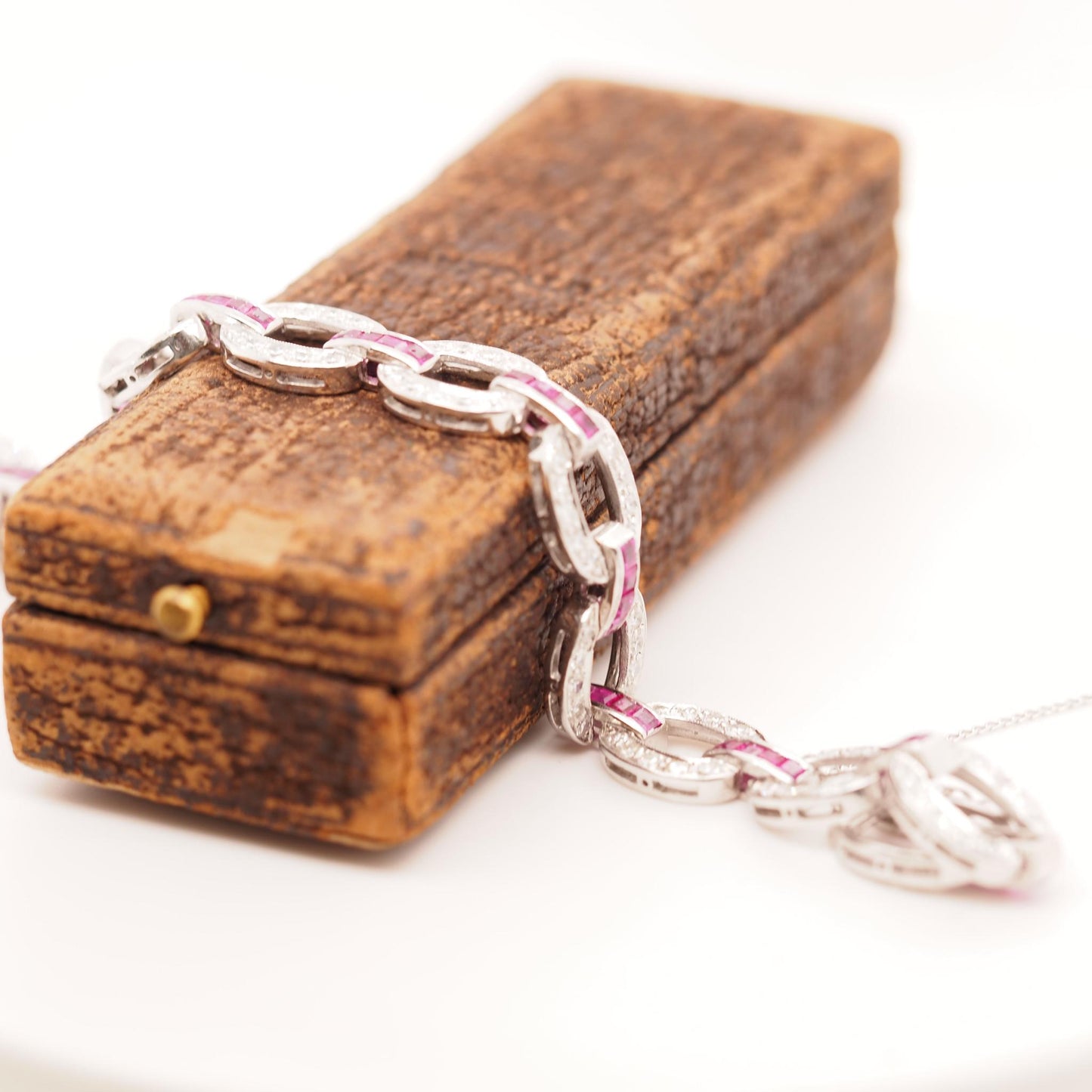 Circa 1930s Art Deco Platinum and Palladium Natural Ruby and Diamond Bracelet