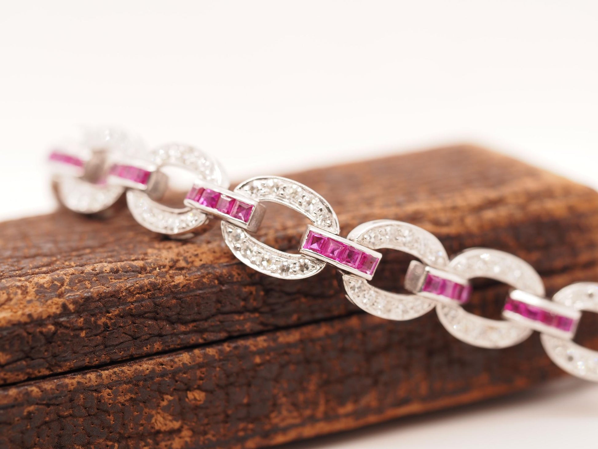 Circa 1930s Art Deco Platinum and Palladium Natural Ruby and Diamond Bracelet