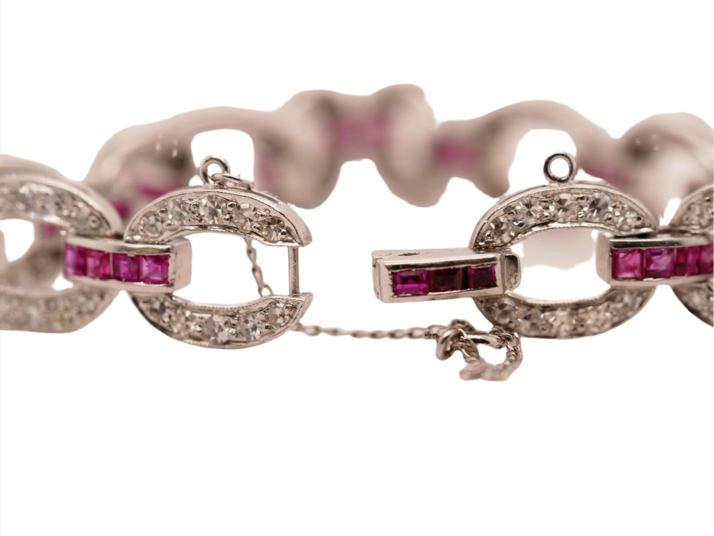 Circa 1930s Art Deco Platinum and Palladium Natural Ruby and Diamond Bracelet