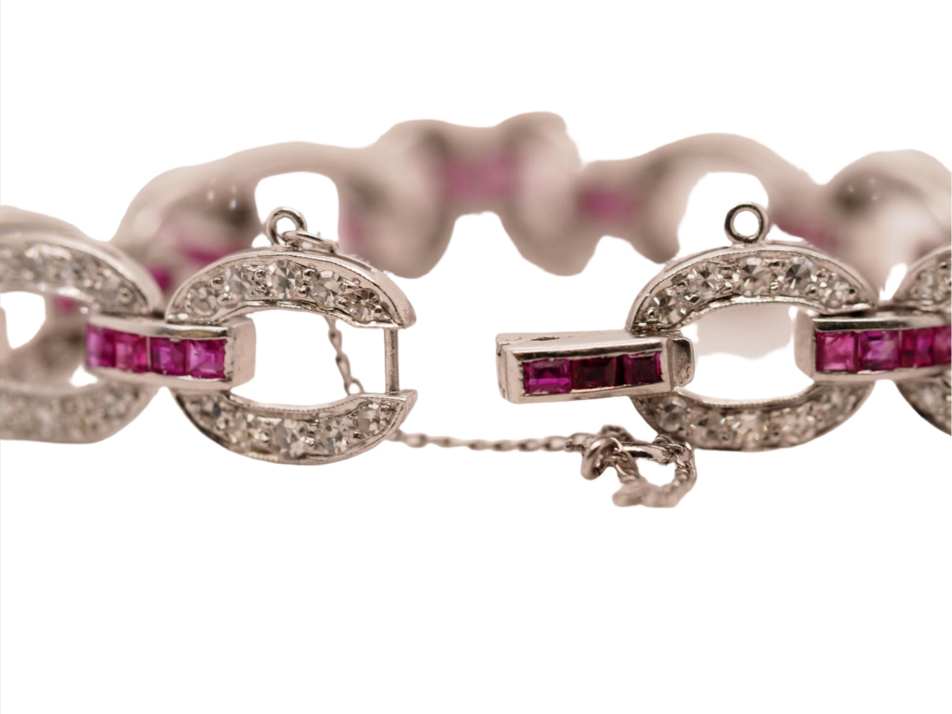 Circa 1930s Art Deco Platinum and Palladium Natural Ruby and Diamond Bracelet