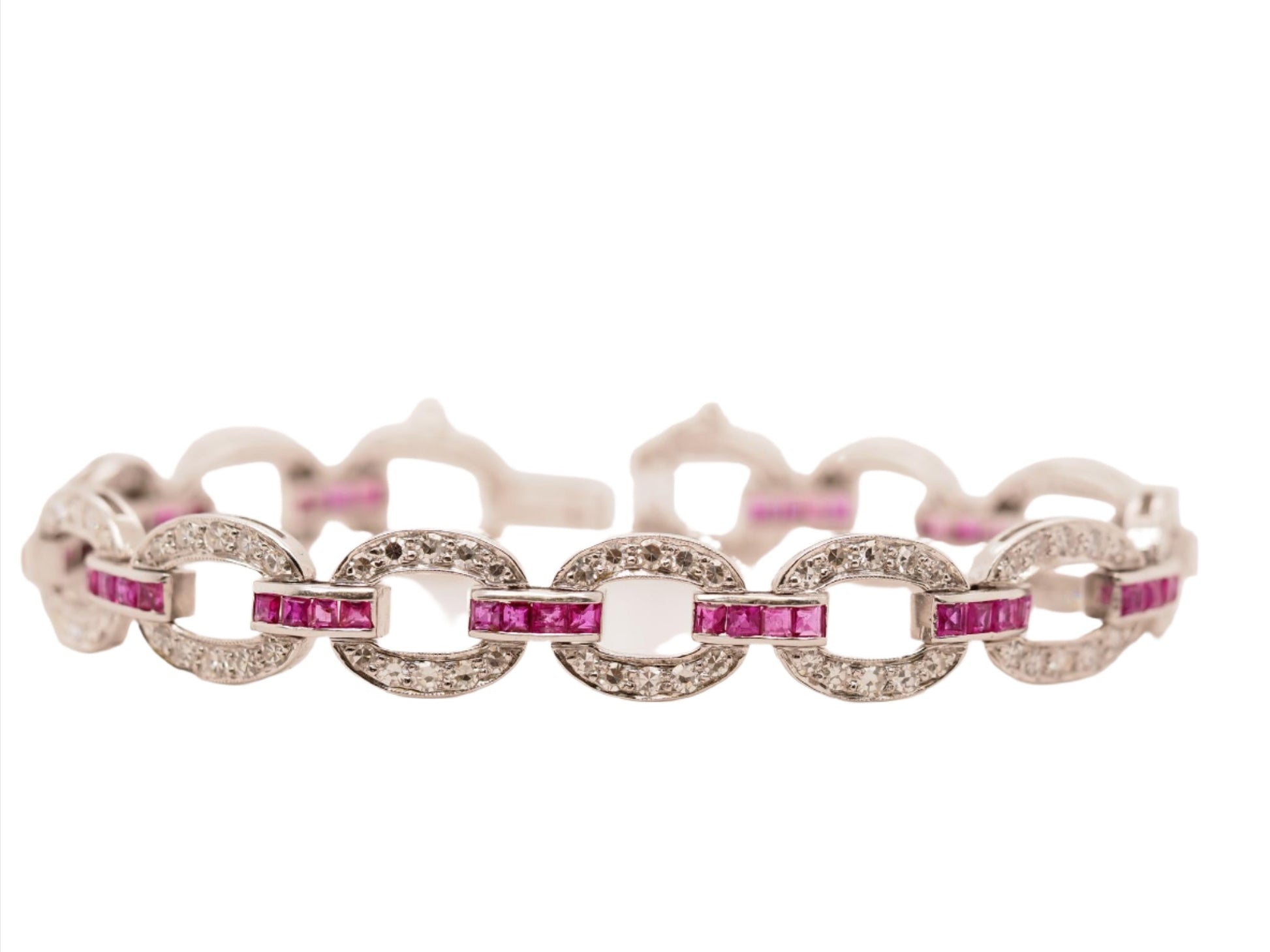 Circa 1930s Art Deco Platinum and Palladium Natural Ruby and Diamond Bracelet