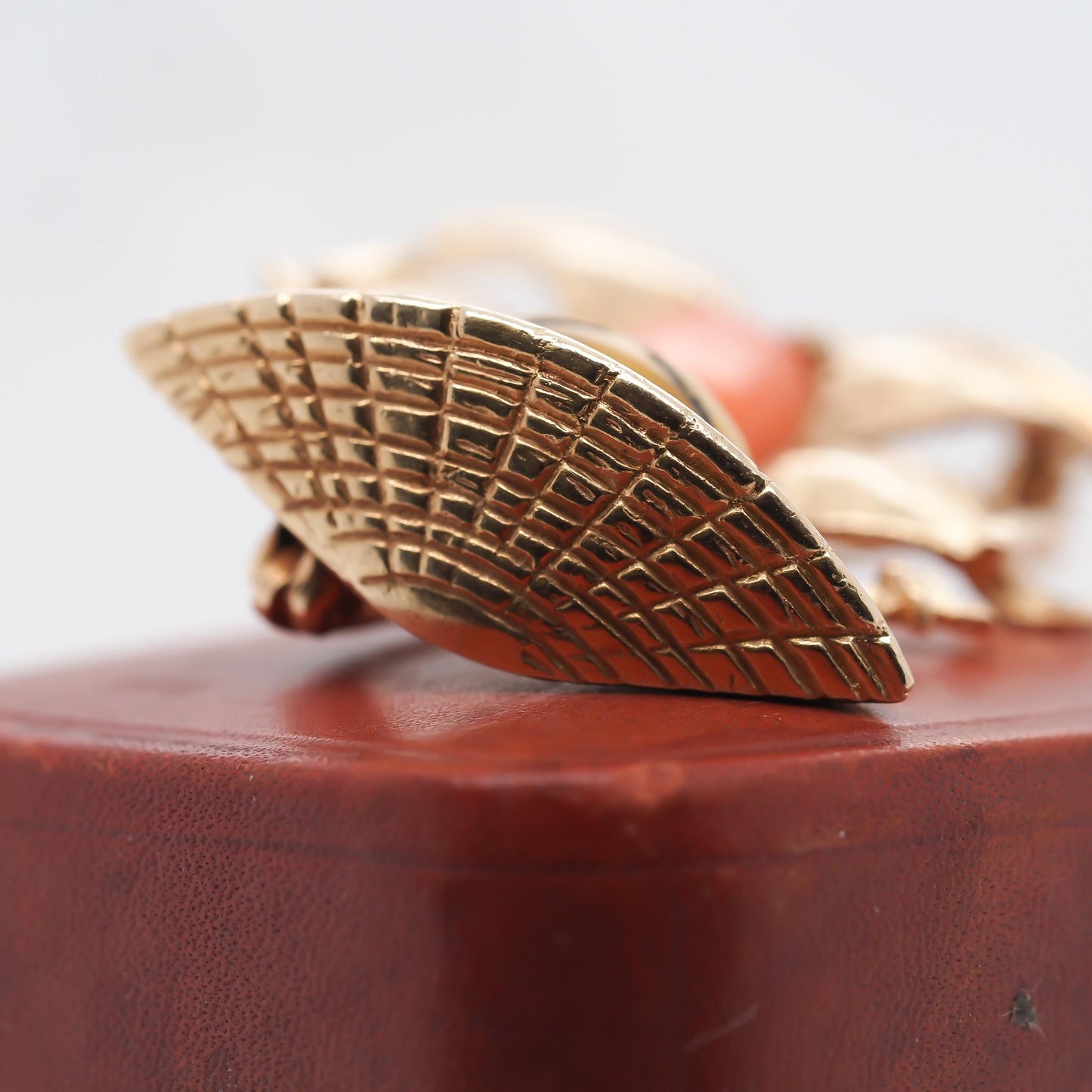 14K Yellow Gold Coral and Tigers Eye Brooch of Person