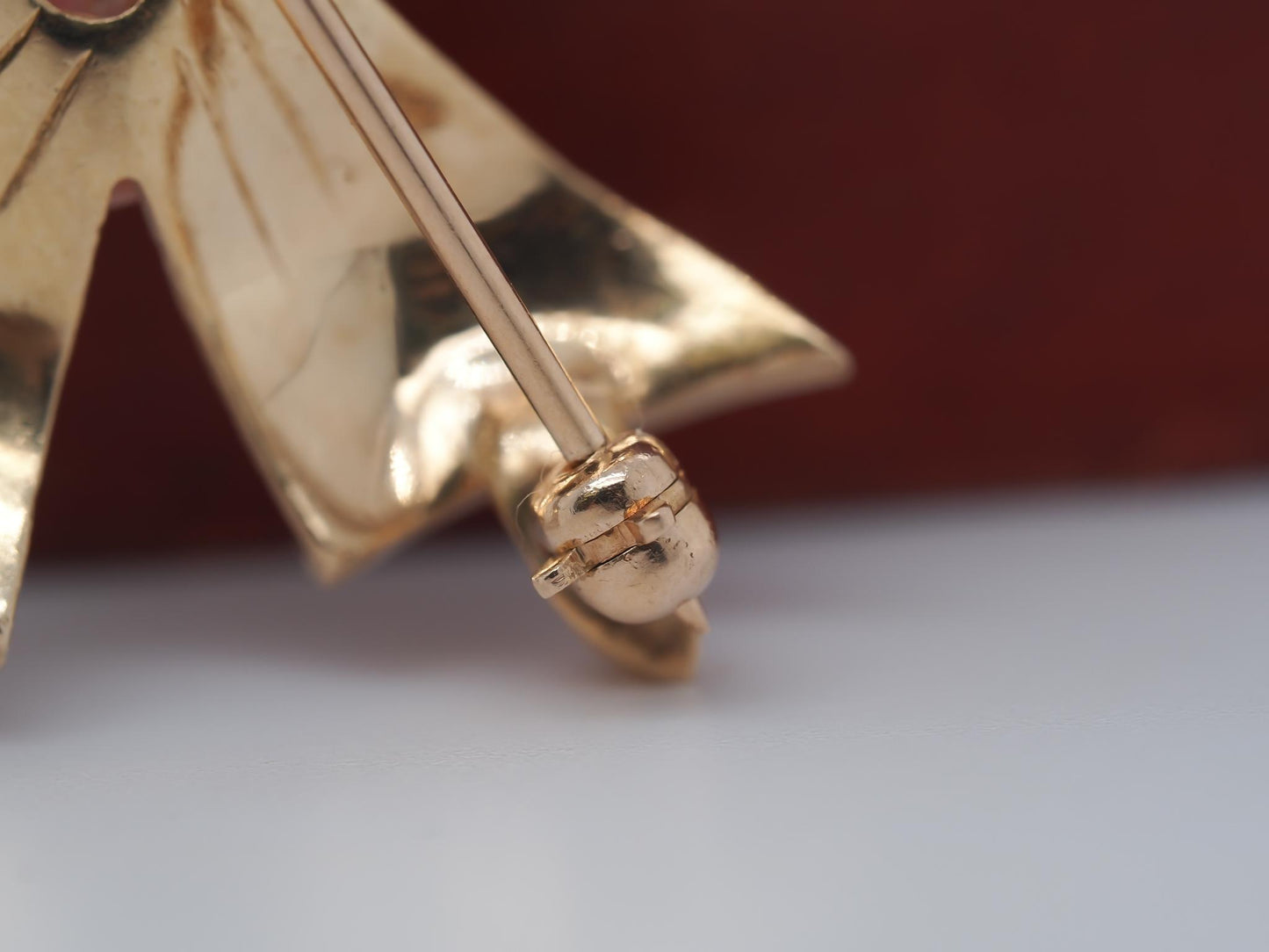14K Yellow Gold Coral and Tigers Eye Brooch of Person