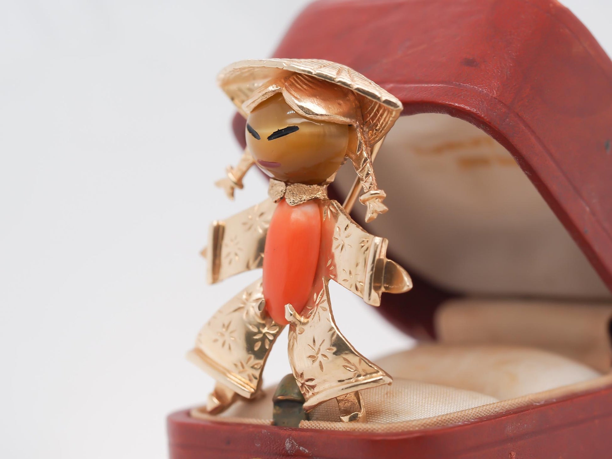 14K Yellow Gold Coral and Tigers Eye Brooch of Person