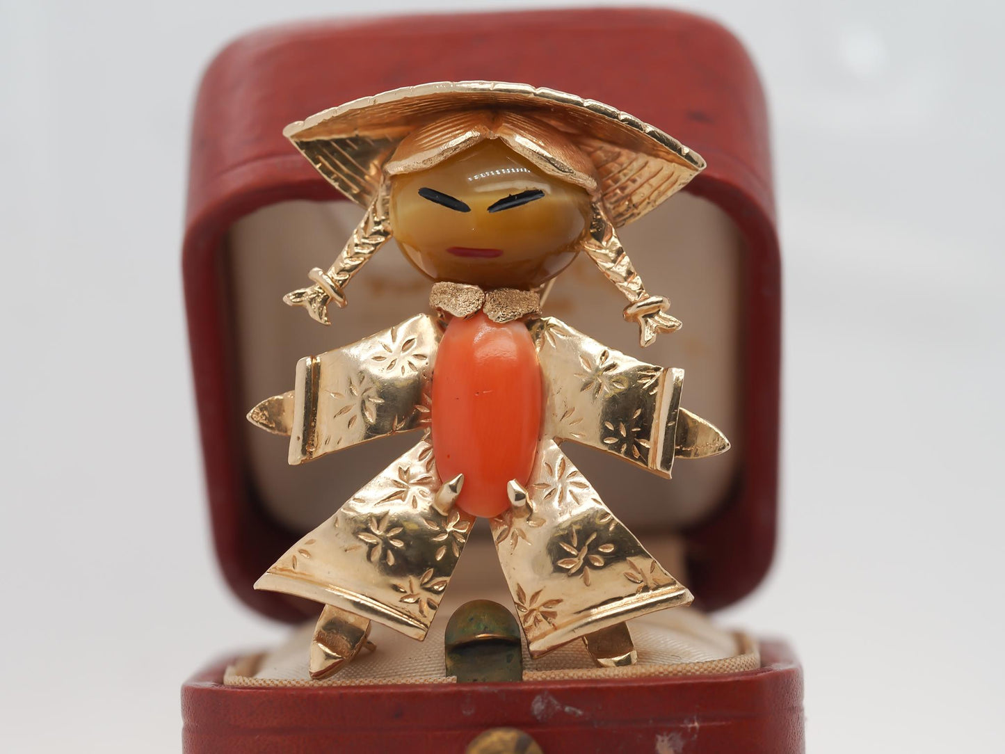 14K Yellow Gold Coral and Tigers Eye Brooch of Person
