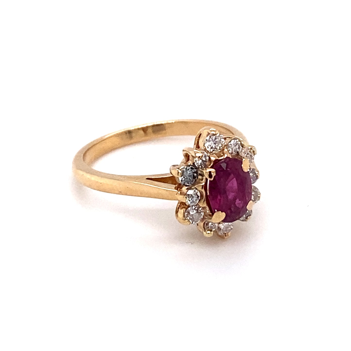 Circa 1960 1 Carat Oval Ruby and Diamond Ring in 14K Gold