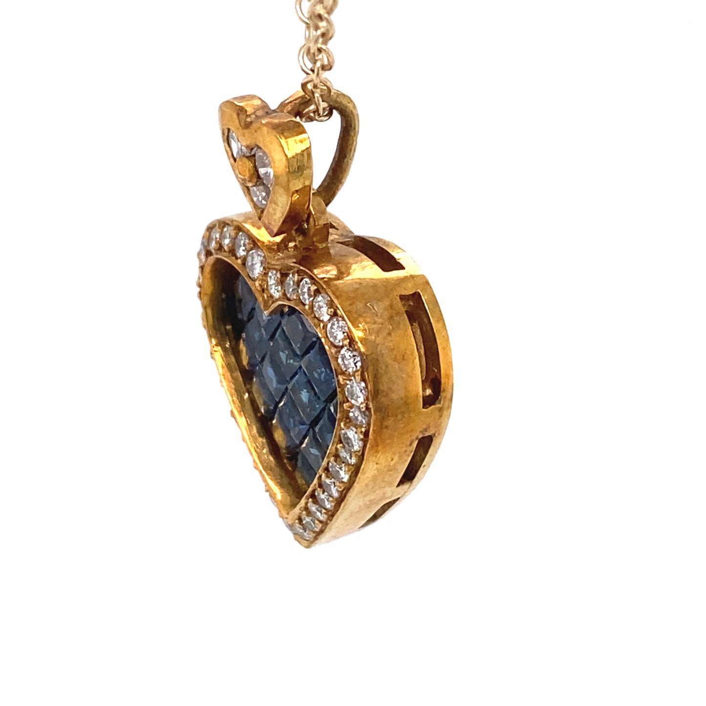 Circa 1980 Custom Invisible Set Sapphire and Diamond Heart Pendant