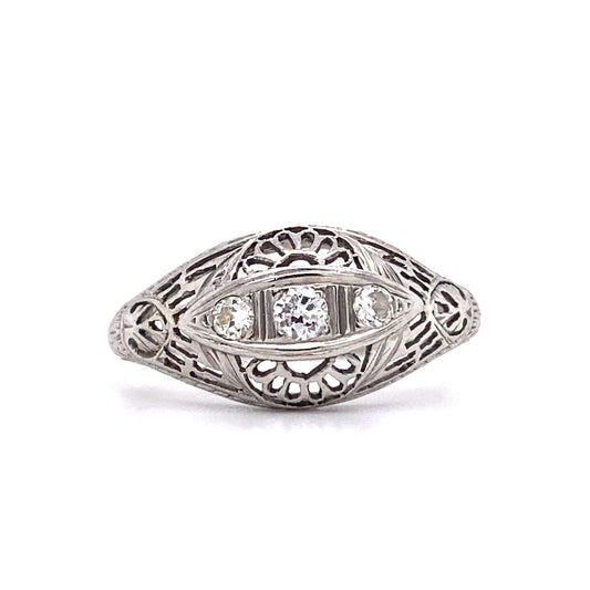 Circa 1920s Art Deco Three Stone Diamond Filigree Ring in 18 Karat White Gold