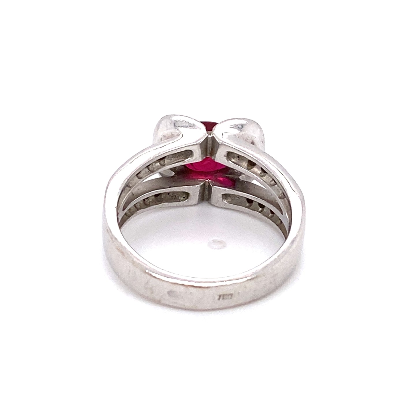 Circa 1990s French 1.20 Carat Oval Ruby and Diamond Ring in Platinum