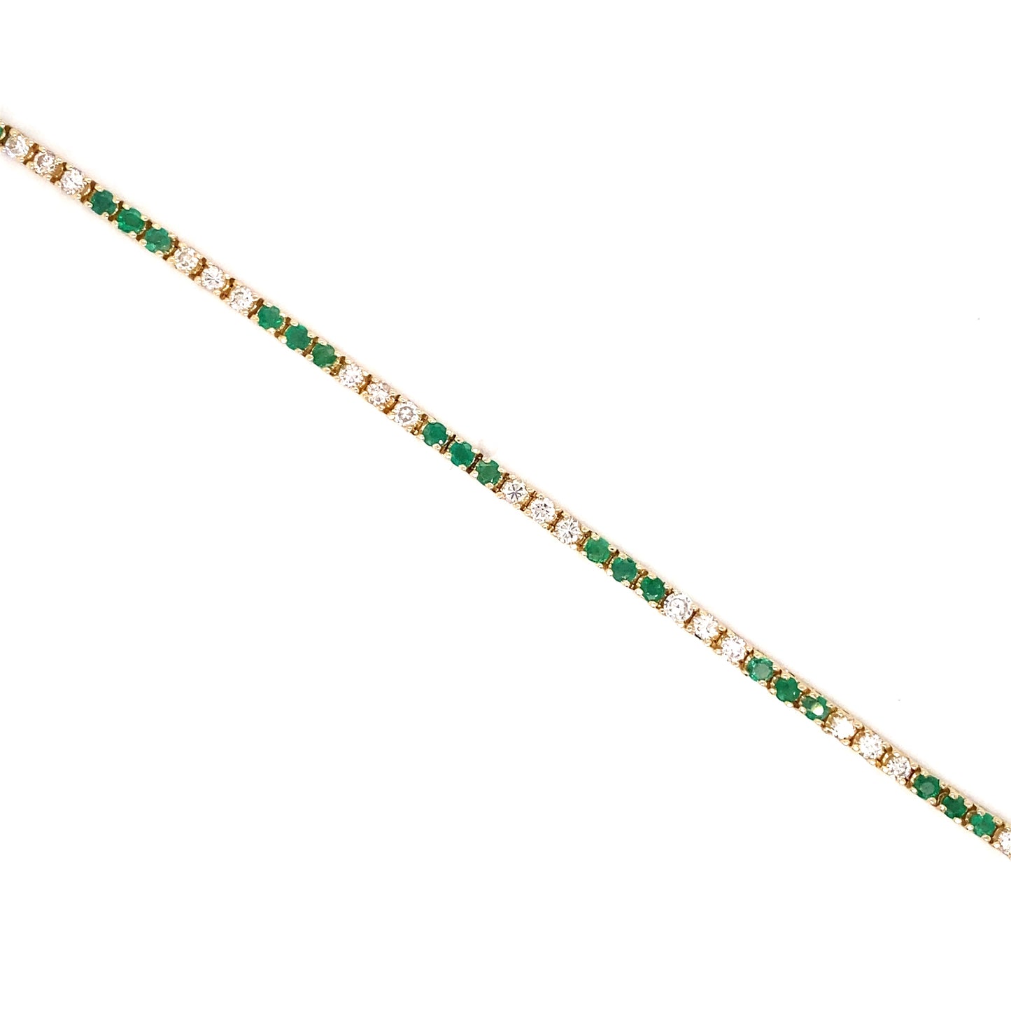 Circa 1980s Alternating Emerald and Diamond Tennis Bracelet in 14K Gold