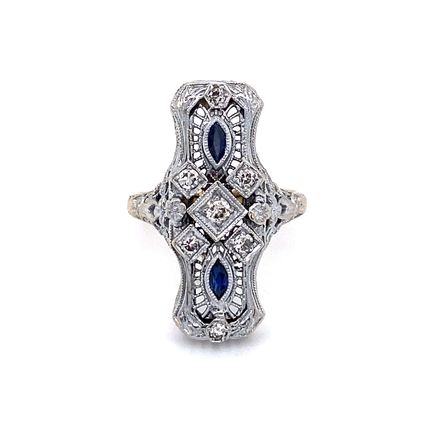 Circa 1920s Art Deco Elongated Filigree Sapphire Ring in Platinum and 18K Gold