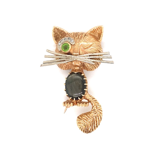 Circa 1960s Star Sapphire, Peridot and Diamond Winking Cat Brooch in 14K Gold