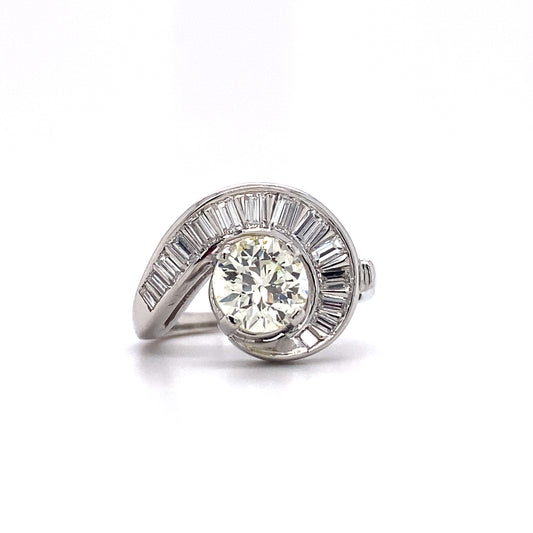 Circa 1950s 1.37 Carat Old European Cut Diamond Swirl Ring in Platinum