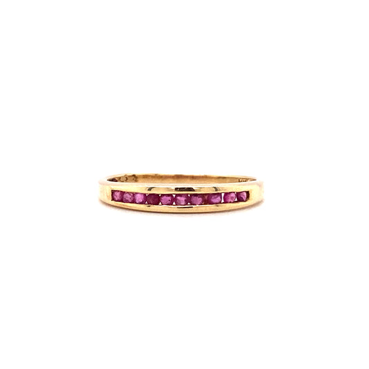 Circa 1980s 0.20 Carat Channel Set Ruby Anniversary Band in 14K Gold