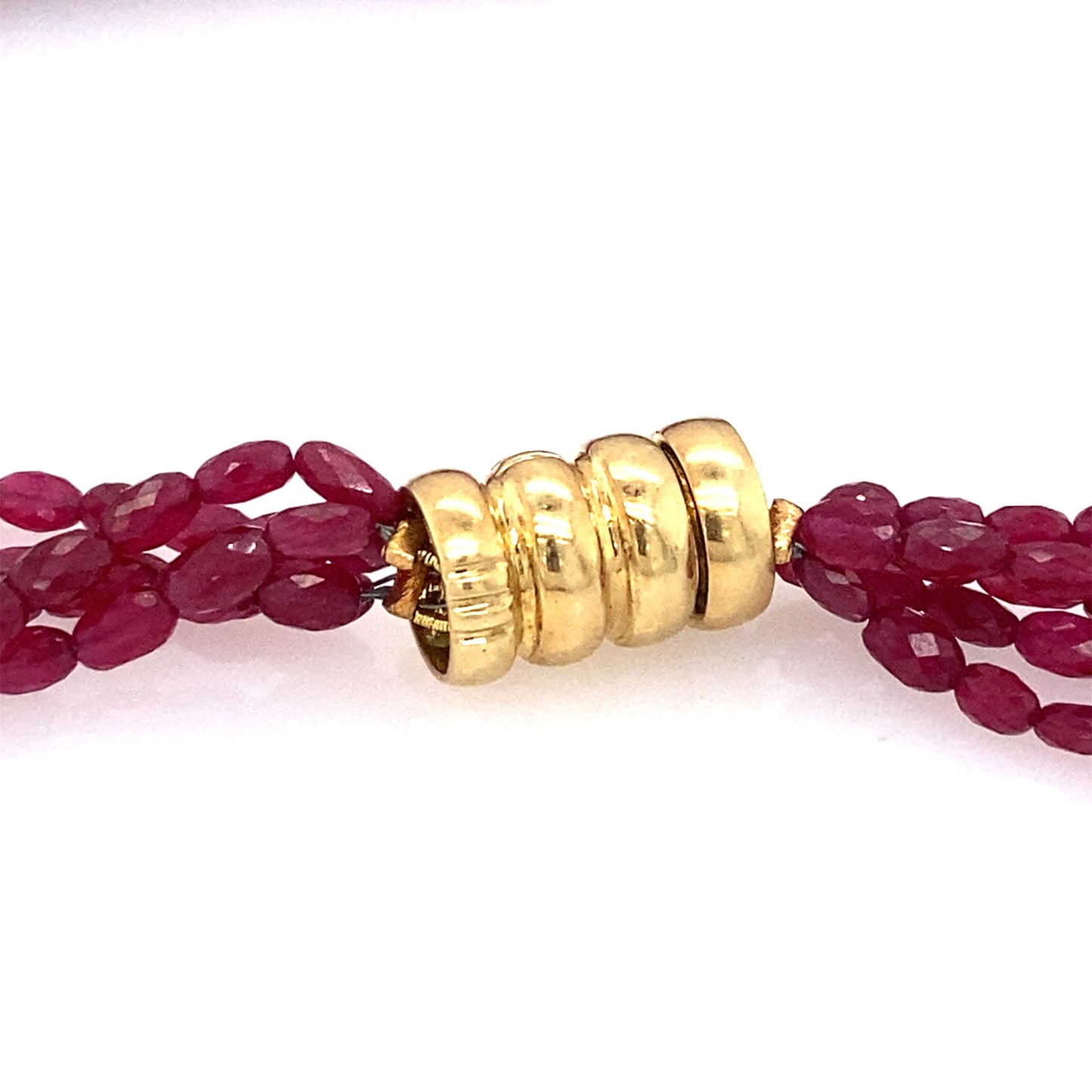 Circa 1990s Five Strand Faceted Ruby Bead Necklace with 18k Gold Magnetic Clasp