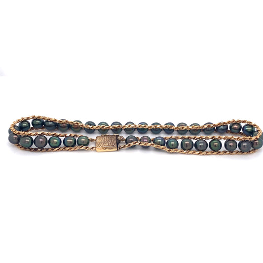 Circa 1980s Tahitian Black Pearl Line Bracelet in 14K Gold