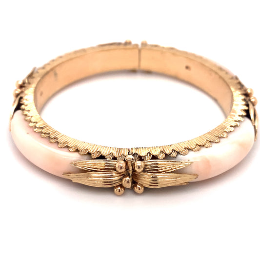 Circa 1940s Georgian Style Angel Skin Coral Hinged Bangle in 18 Karat Gold