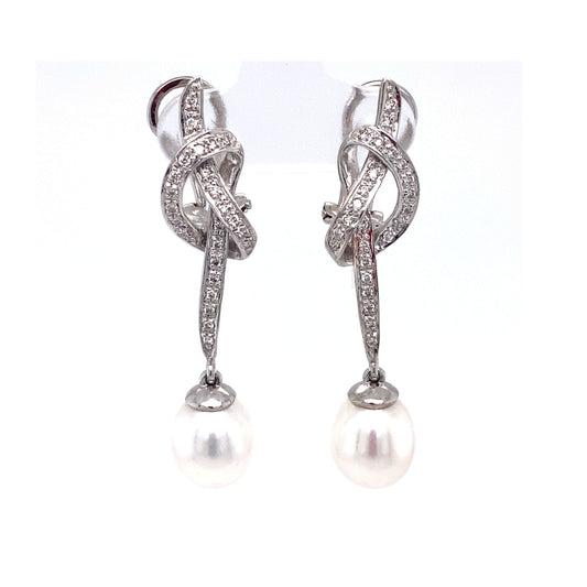 Circa 1980s 0.75 Carat Diamond and Pearl Knot Dangle Earrings in 18K White Gold