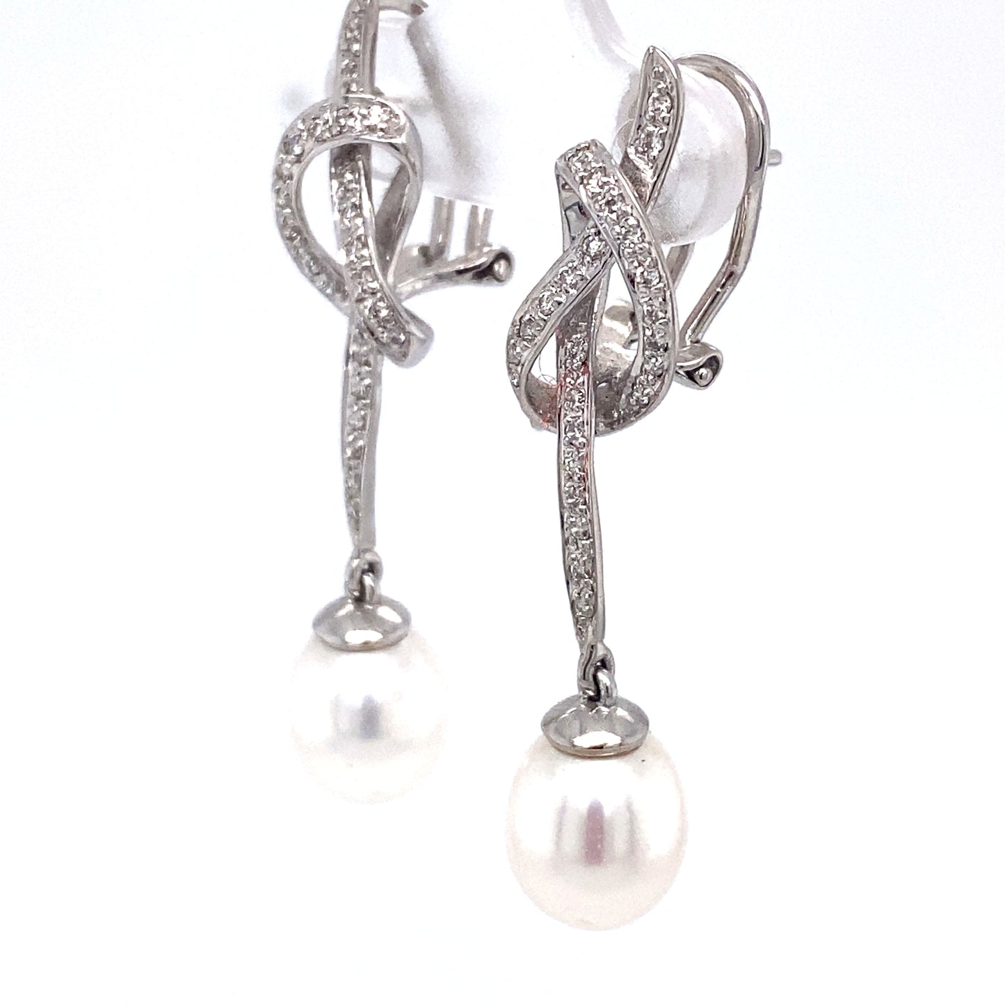 Circa 1980s 0.75 Carat Diamond and Pearl Knot Dangle Earrings in 18K White Gold