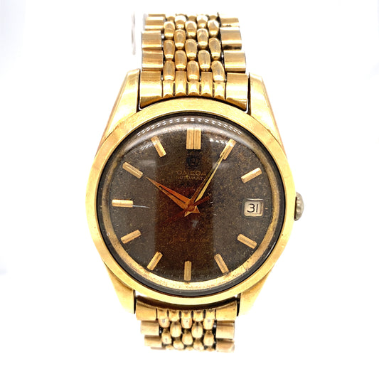 Circa 1960s Omega Seamaster Gold Tone Calendar Wrist Watch with Stardust Dial