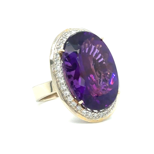 Circa 2000s Large Oval Brilliant Amethyst Ring with Diamonds in 14K Gold