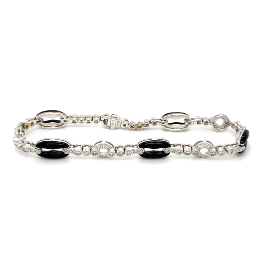 Circa 1960s Onyx and Diamond Link Bracelet in 18K White Gold