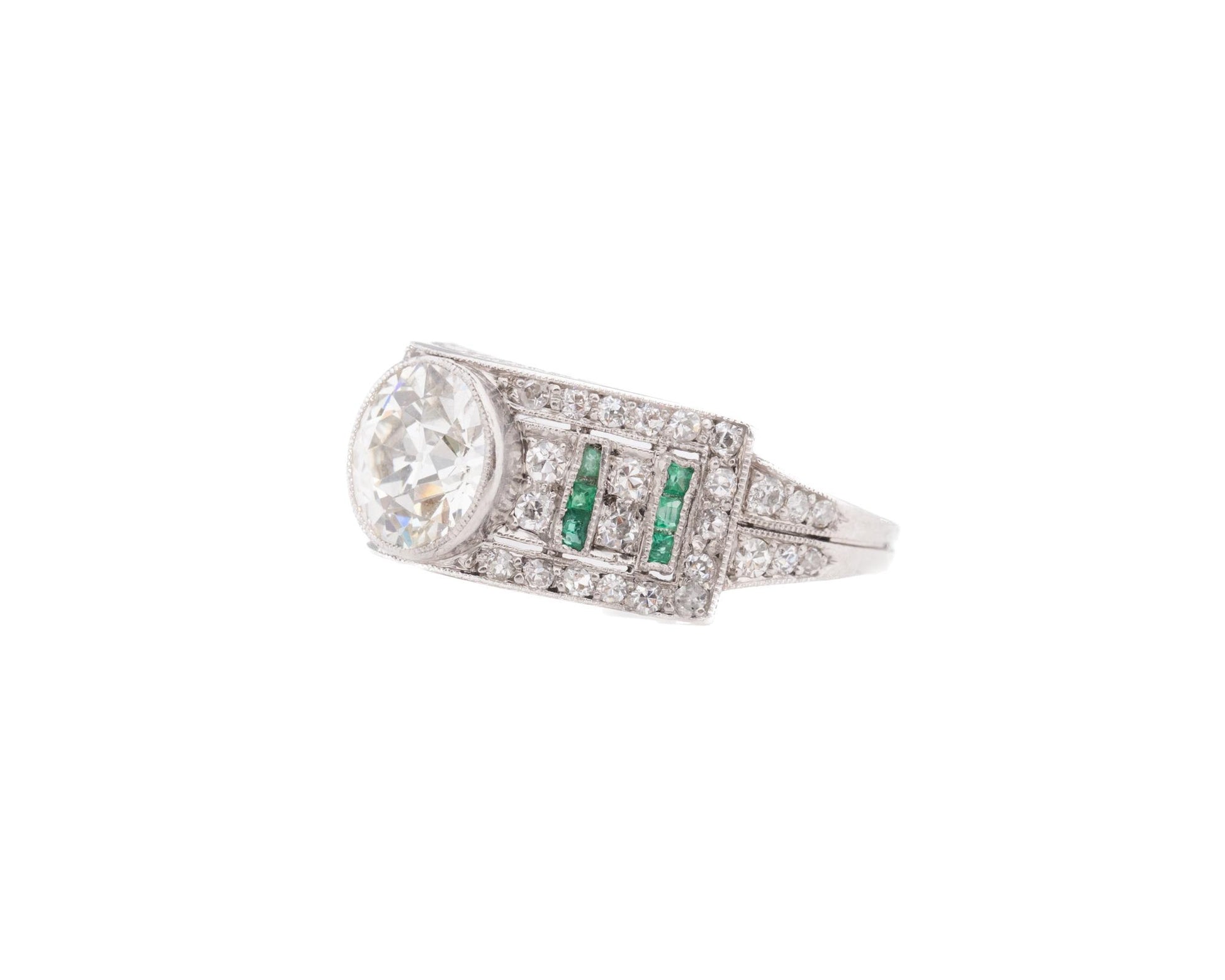 Circa 1920s Art Deco Emerald and Old European Diamond Engagement Ring