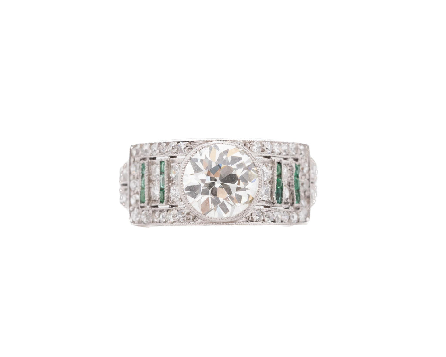 Circa 1920s Art Deco Emerald and Old European Diamond Engagement Ring