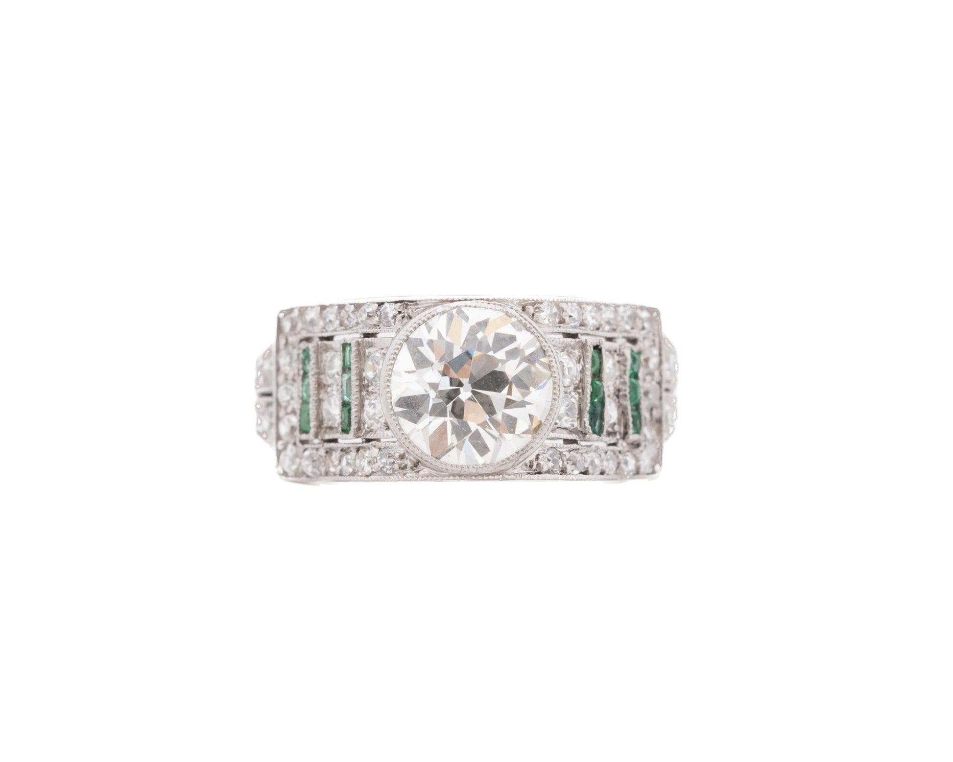 Circa 1920s Art Deco Emerald and Old European Diamond Engagement Ring